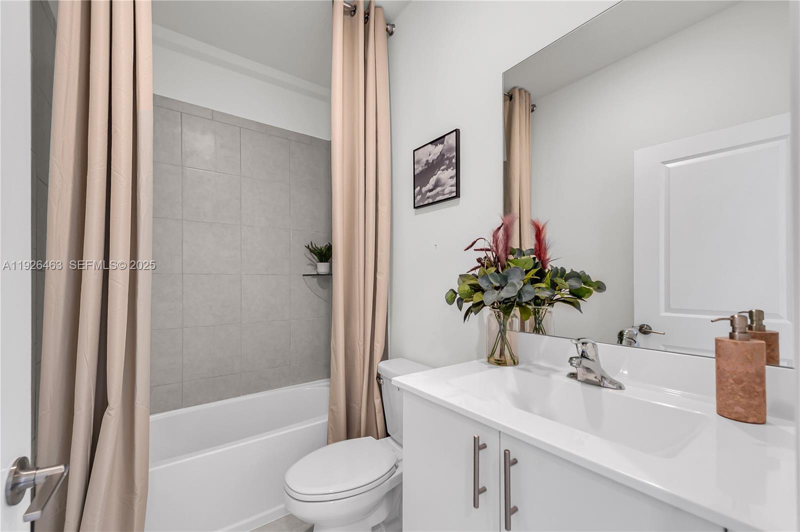 12976 Southwest 233rd Terrace Homestead, FL 33032 - Photo 23 of 27 a bathroom with a sink a toilet and shower