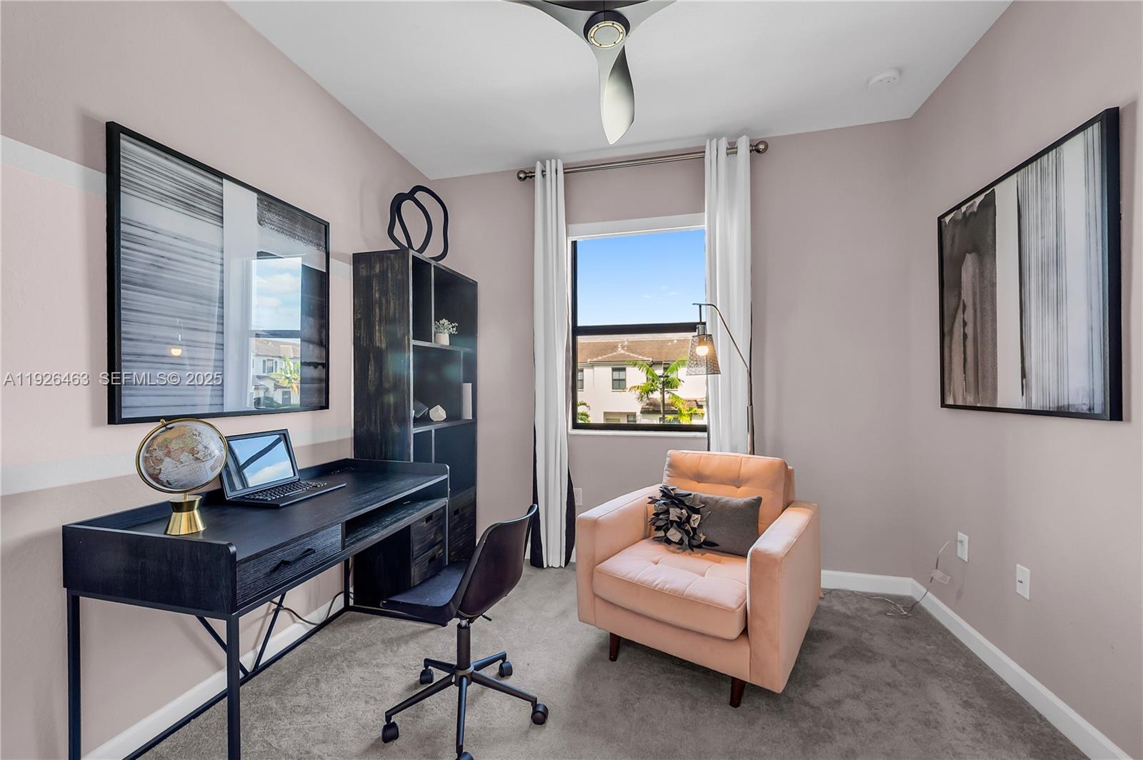 12976 Southwest 233rd Terrace Homestead, FL 33032 - Photo 25 of 27 a living room with furniture and wooden floor