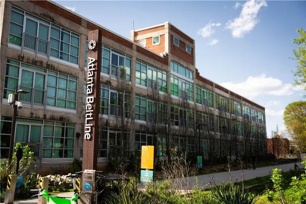 an outdoor view of a building with a garden