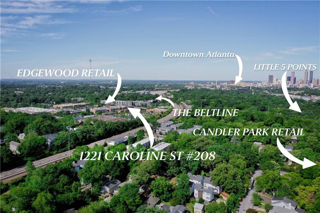 1221 Caroline Street Northeast, Unit 208 Atlanta, GA 30307 - Photo 6 of 26 a view of a sign in a garden