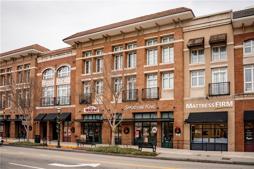 1221 Caroline Street Northeast, Unit 208 Atlanta, GA 30307 - Photo 8 of 26 a front view of multi story building