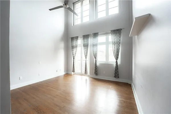 a kitchen with stainless steel appliances granite countertop a refrigerator stove and microwave