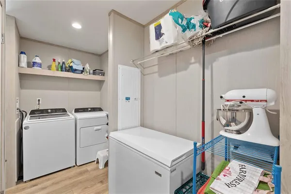a utility room with dryer and washer