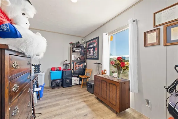 a room with furniture and a flat screen tv