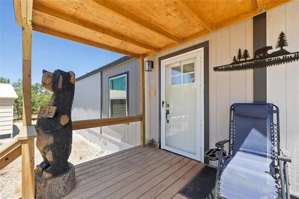 a view of front door and deck