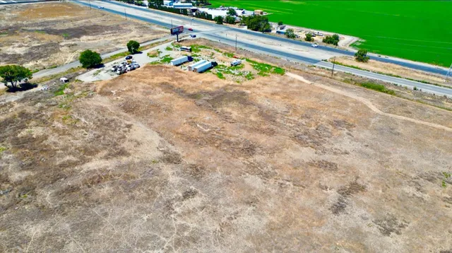 wooden floor with some trees in the background
