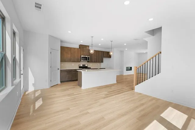 an empty room with windows