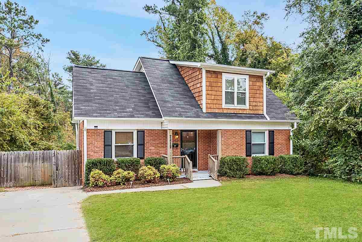 2212 Rumson Road Raleigh, NC 27610 - Photo 2 of 19 a front view of a house with a yard