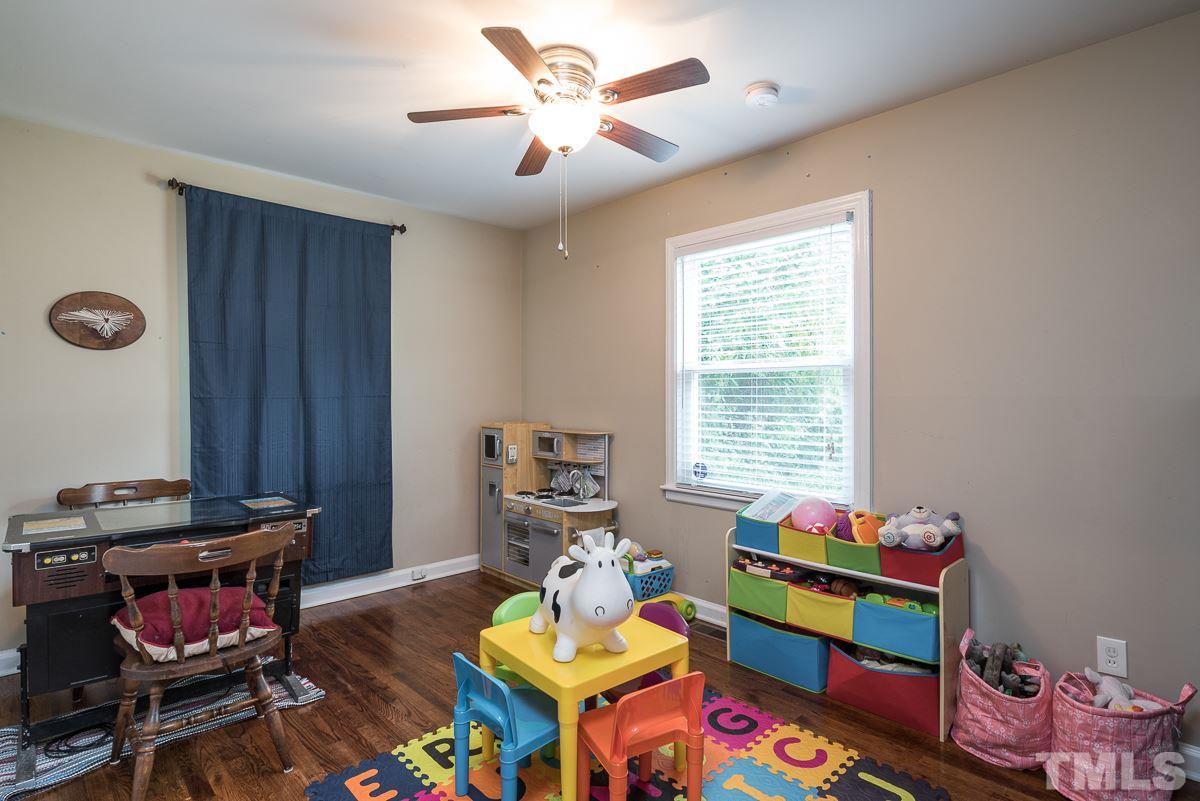 2212 Rumson Road Raleigh, NC 27610 - Photo 11 of 19 a living room with furniture and a window