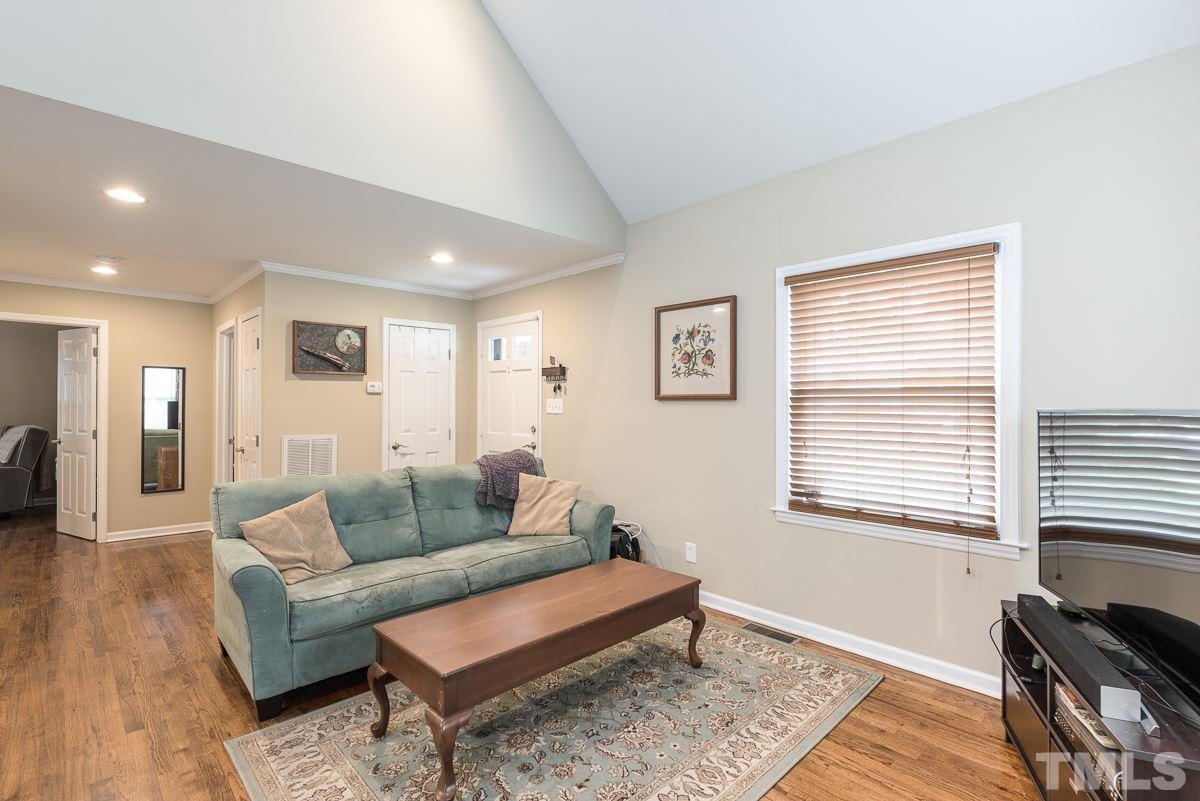 2212 Rumson Road Raleigh, NC 27610 - Photo 5 of 19 a living room with furniture and a window