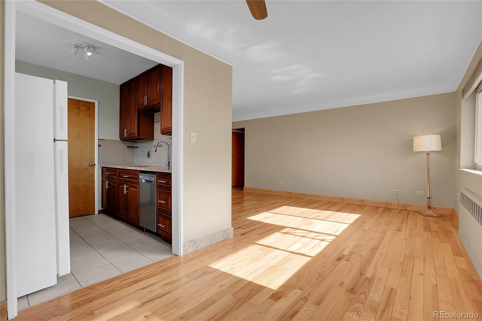 1175 Emerson Street, Unit 202 Denver, CO 80218 - Photo 13 of 31 a view of kitchen and utility room