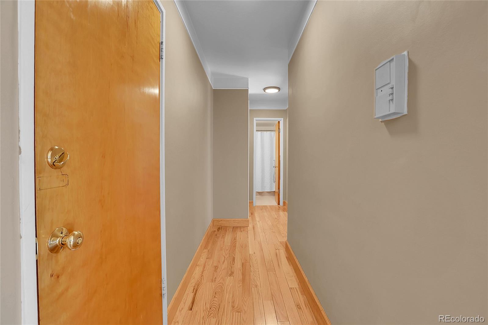1175 Emerson Street, Unit 202 Denver, CO 80218 - Photo 17 of 31 a view of a bathroom from the hallway