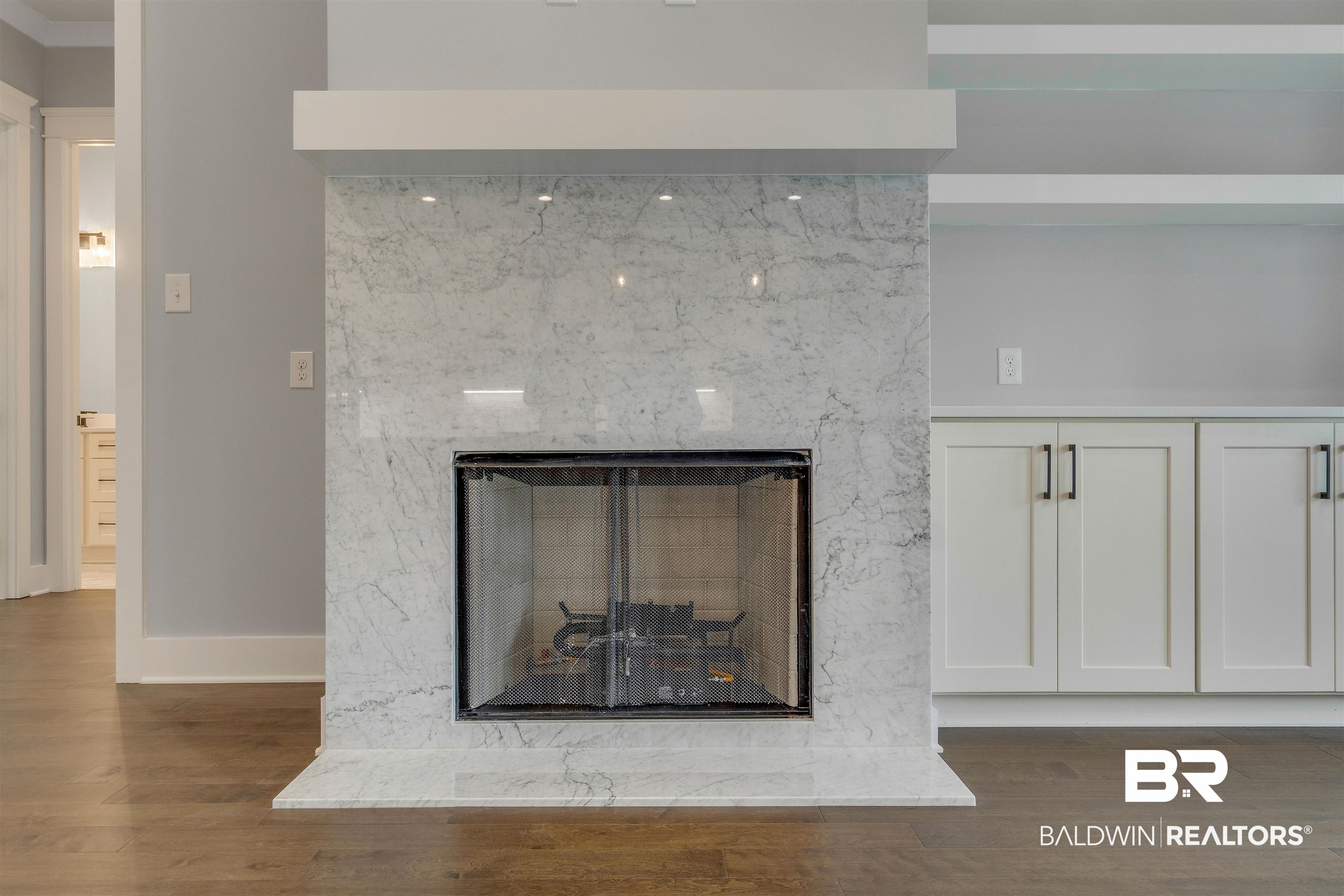 10985 Atrium Avenue Fairhope, AL 36532 - Photo 14 of 58 Detailed view of wood finished floors and a premium fireplace