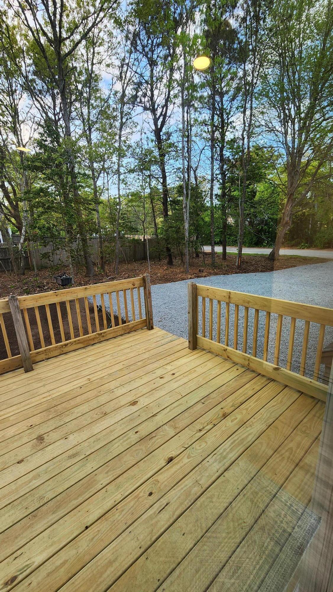 147 Chippingstone Road Marstons Mills, MA 02648 - Photo 14 of 23 a view of wooden deck and a lake view