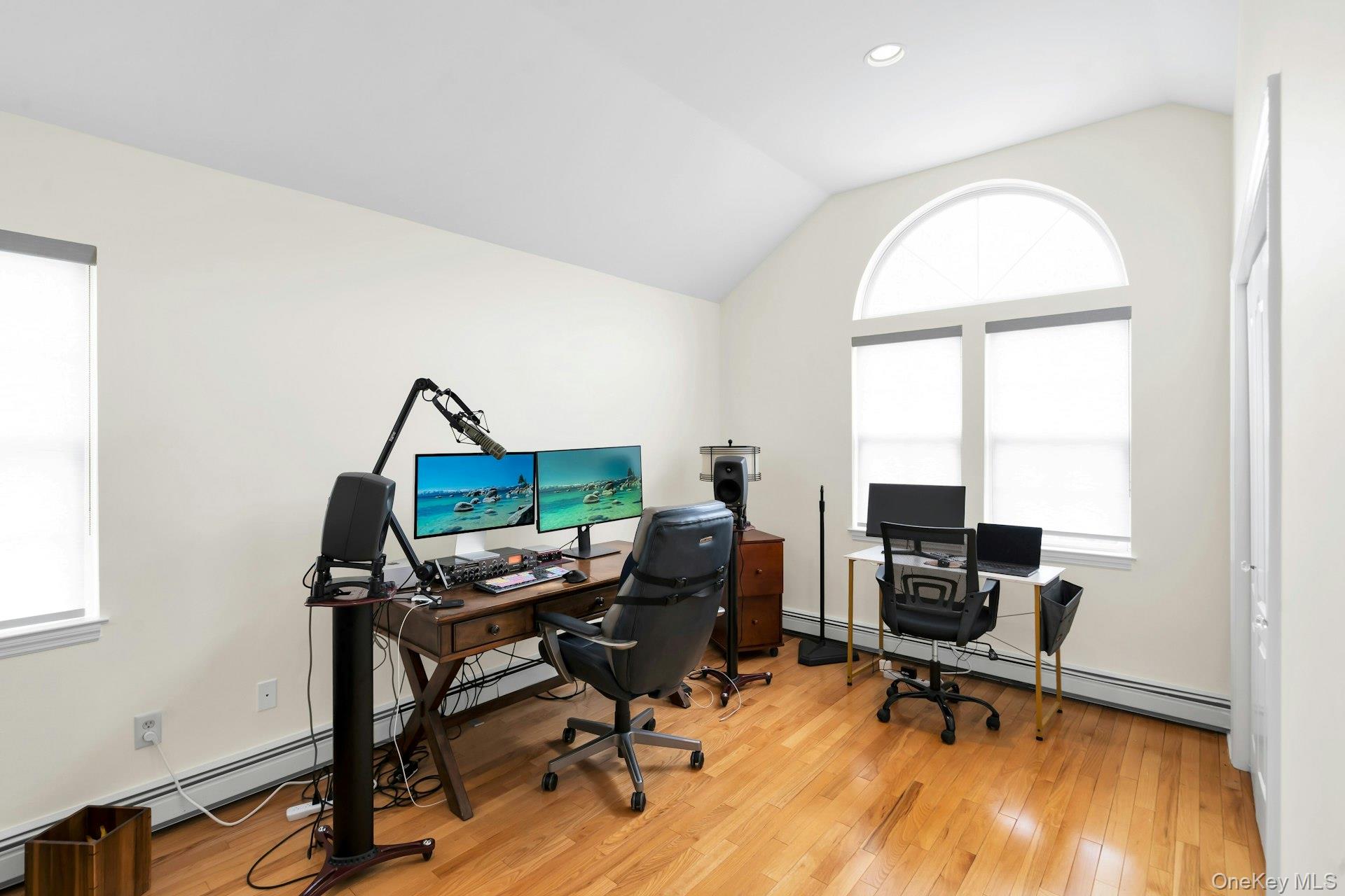 52 Edgewood Road Port Washington, NY 11050 - Photo 15 of 29 a view of a workspace with furniture and a window