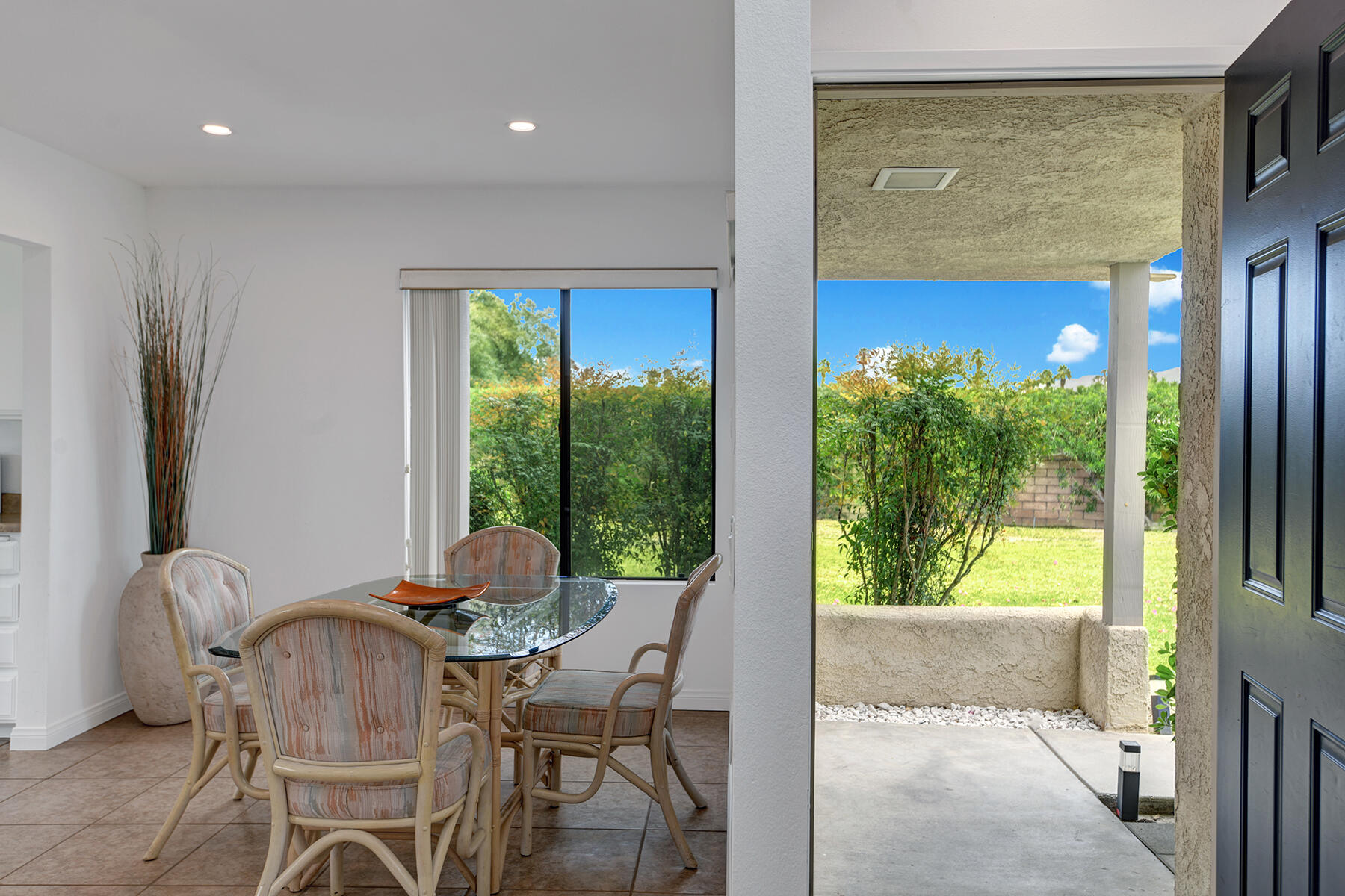 235 Vía Rengo Palm Desert, CA 92260 - Photo 2 of 16 ENTRY WAY REVERSE WITH DINING RS