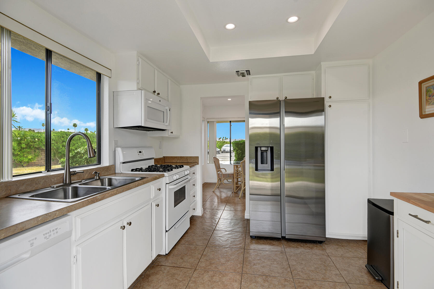 235 Vía Rengo Palm Desert, CA 92260 - Photo 6 of 16 KITCHEN REVERSE STRAIGHT ON RS