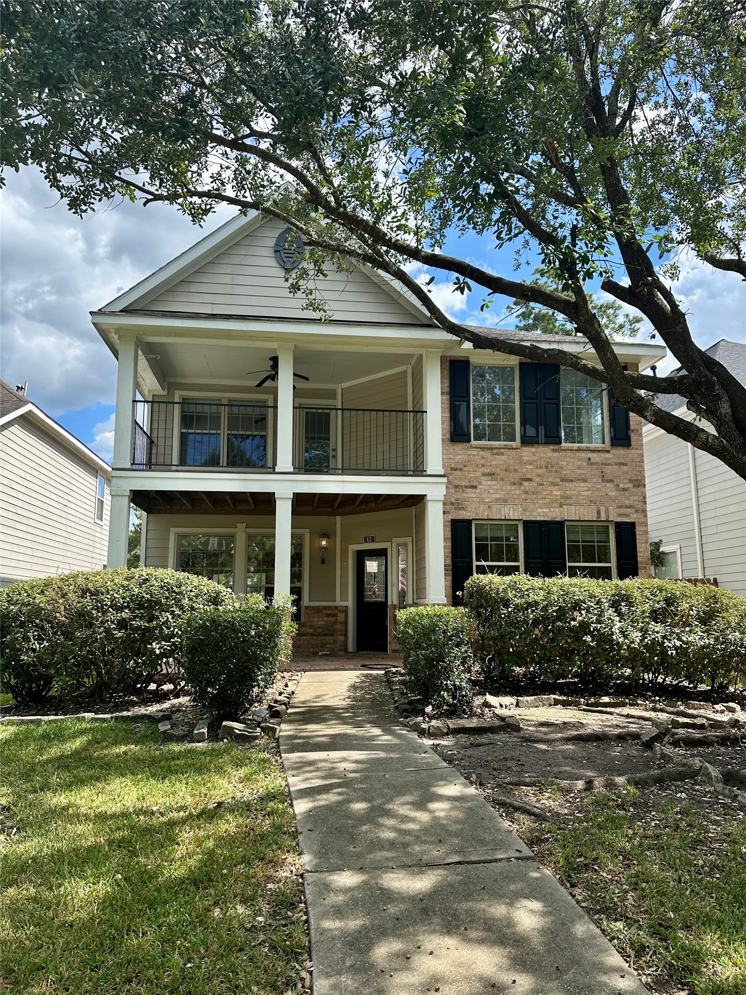 43 Panterra Way Spring, TX 77382 - Photo 1 of 17 a front view of a house with a yard and plants