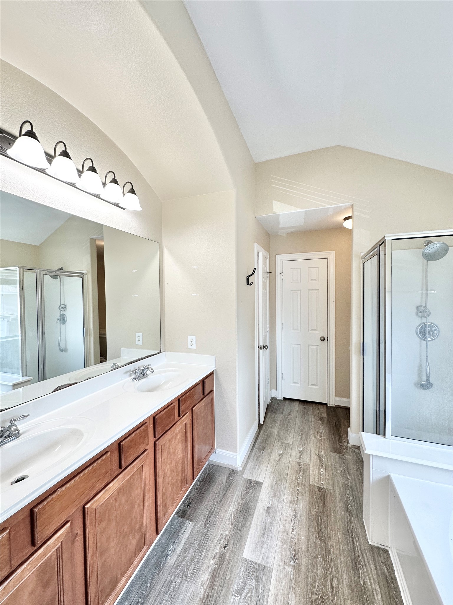 43 Panterra Way Spring, TX 77382 - Photo 16 of 17 a spacious bathroom with a double vanity sink and mirror