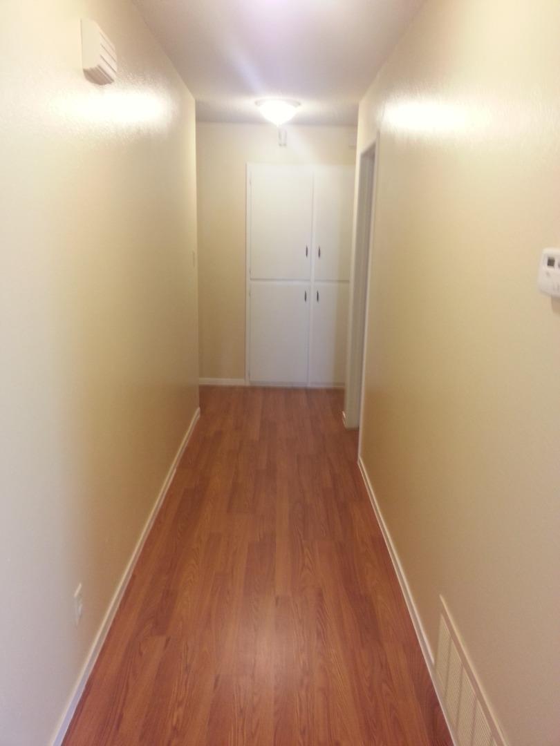 856 Modoc Street Merced, CA 95340 - Photo 14 of 16 a view of a small space with wooden floor