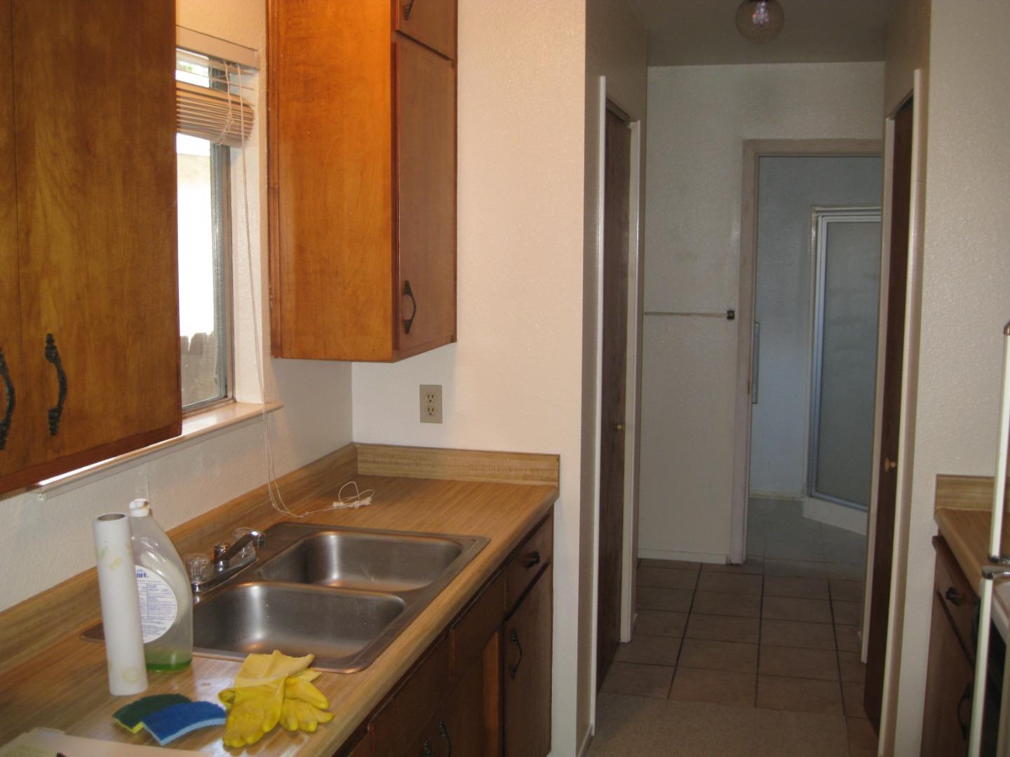 856 Modoc Street Merced, CA 95340 - Photo 15 of 16 a bathroom with a sink and a bathtub