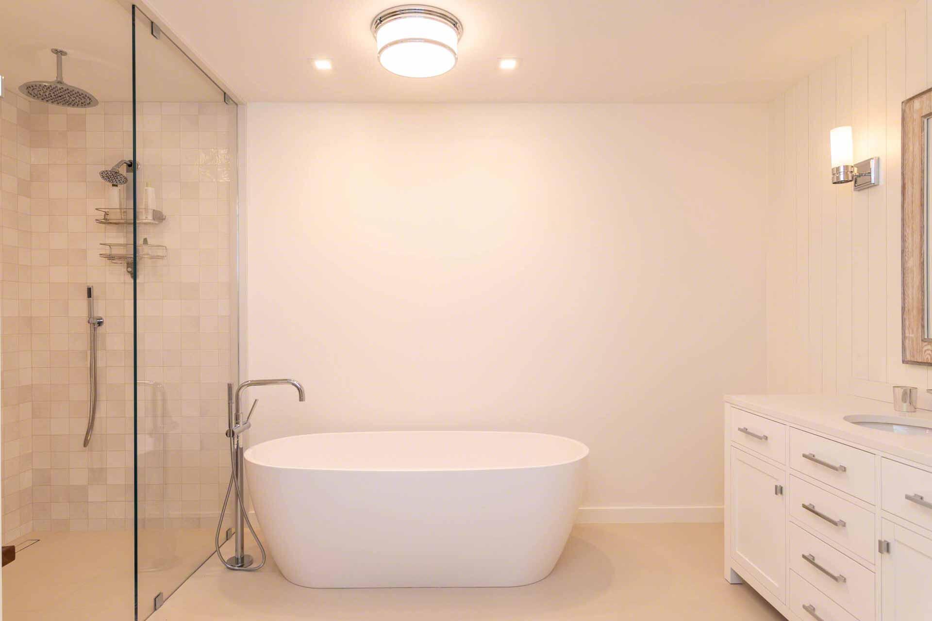 76 Menemsha Inn Road Chilmark, MA 02535 - Photo 32 of 39 a bathroom with a bathtub and shower