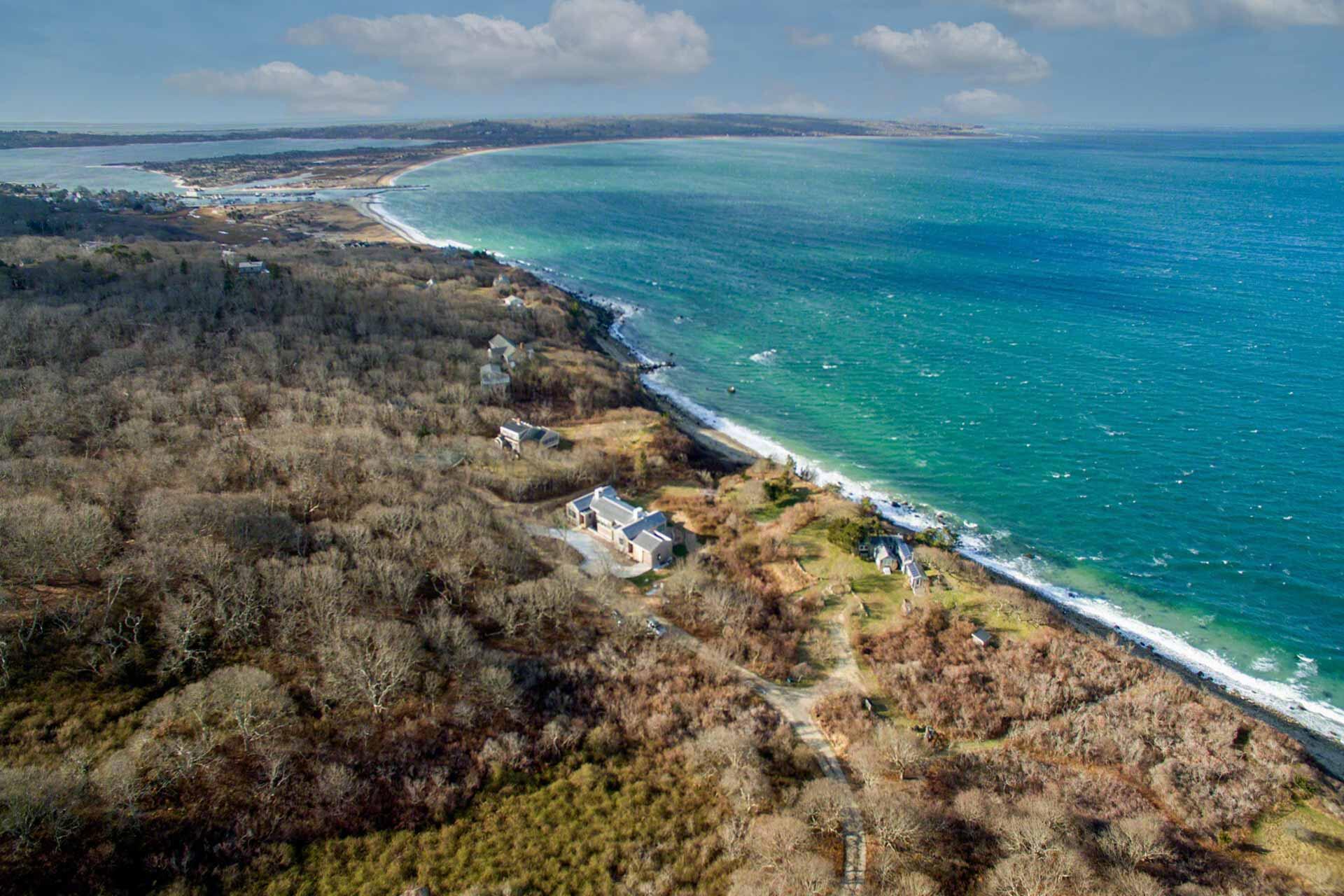 76 Menemsha Inn Road Chilmark, MA 02535 - Photo 5 of 39 a view of a yard with an outdoor space