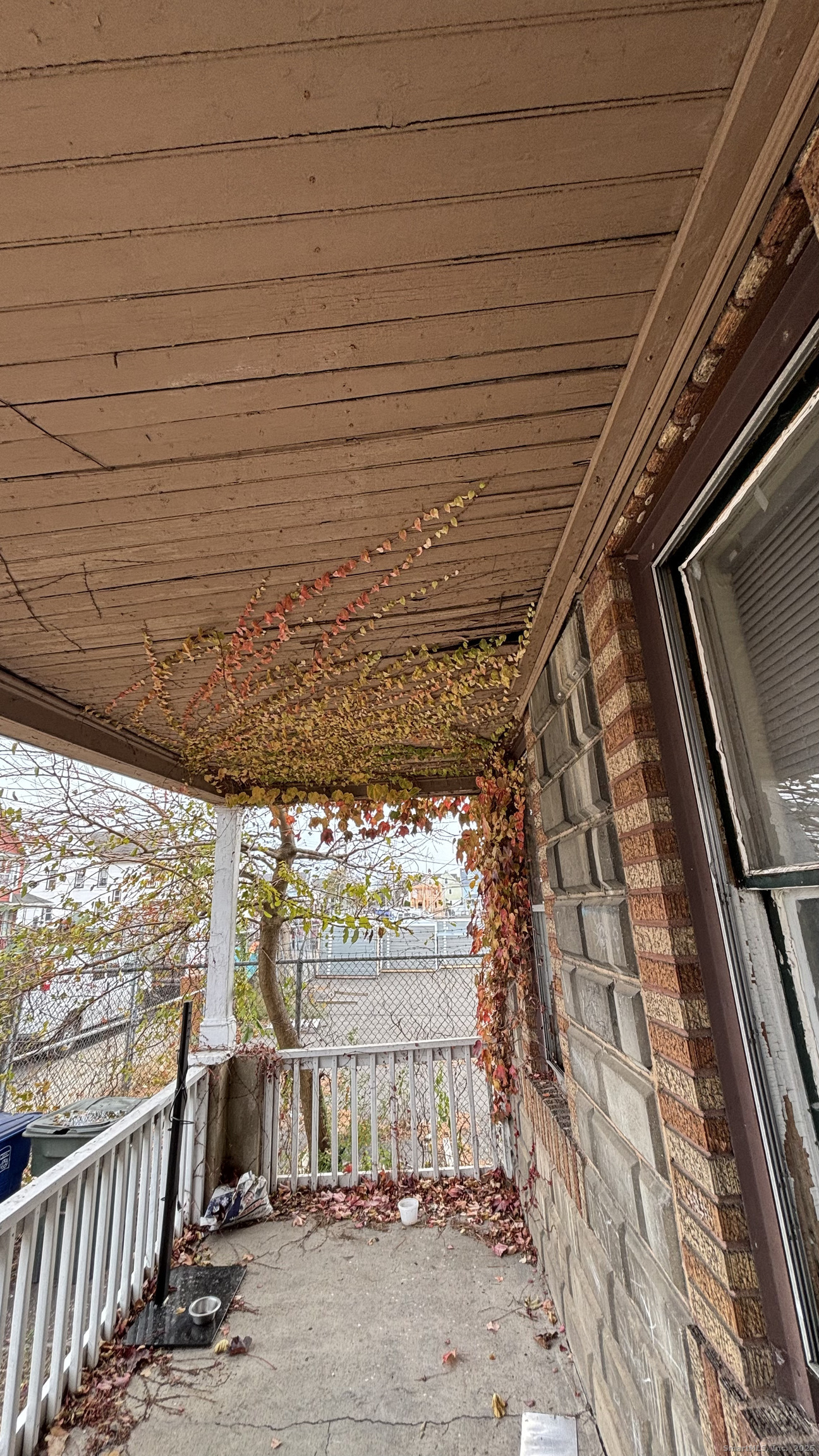 179 4th Street Bridgeport, CT 06607 - Photo 11 of 11 a view of a porch with wooden floor