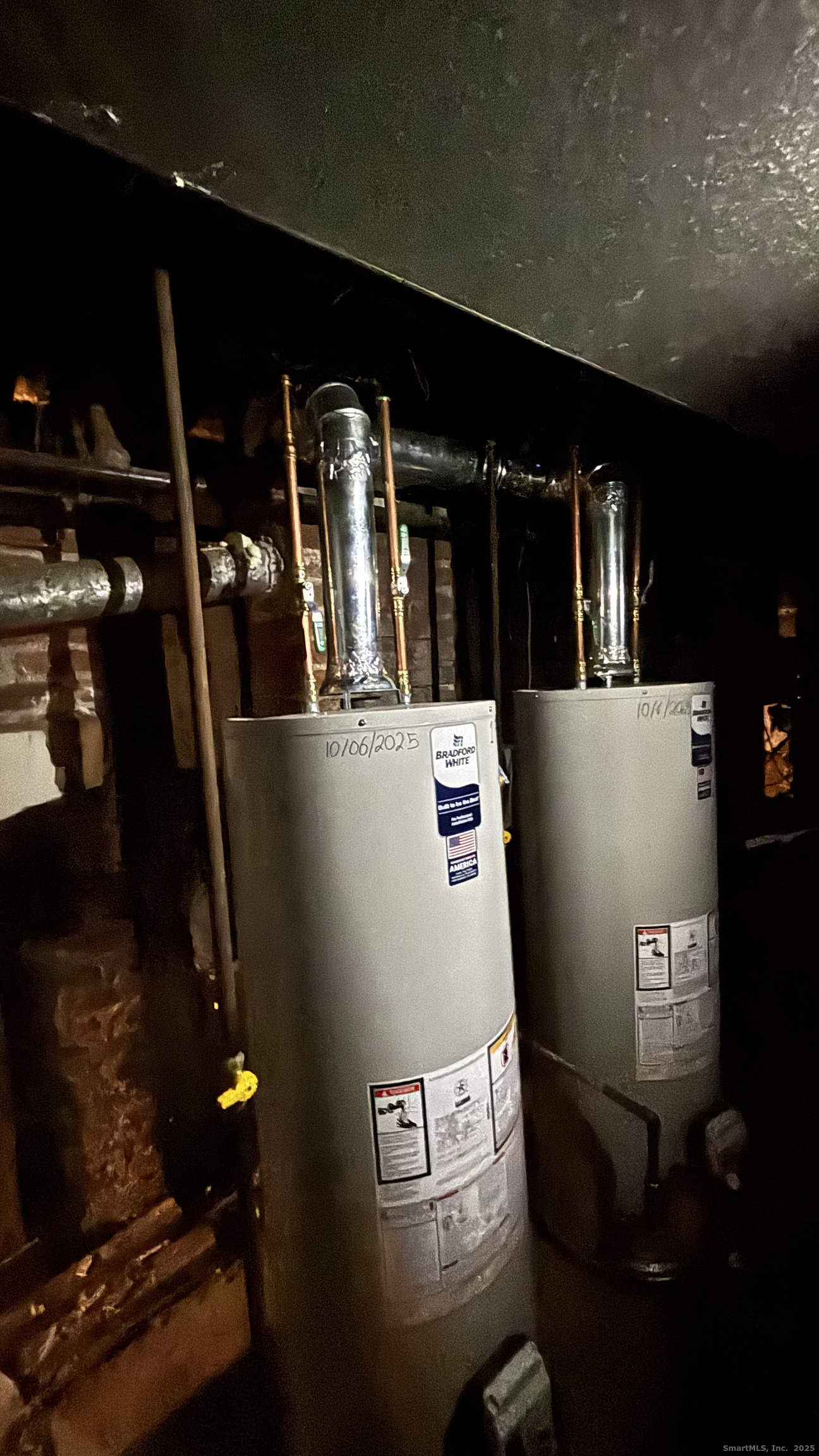 179 4th Street Bridgeport, CT 06607 - Photo 3 of 11 a view of water heater room