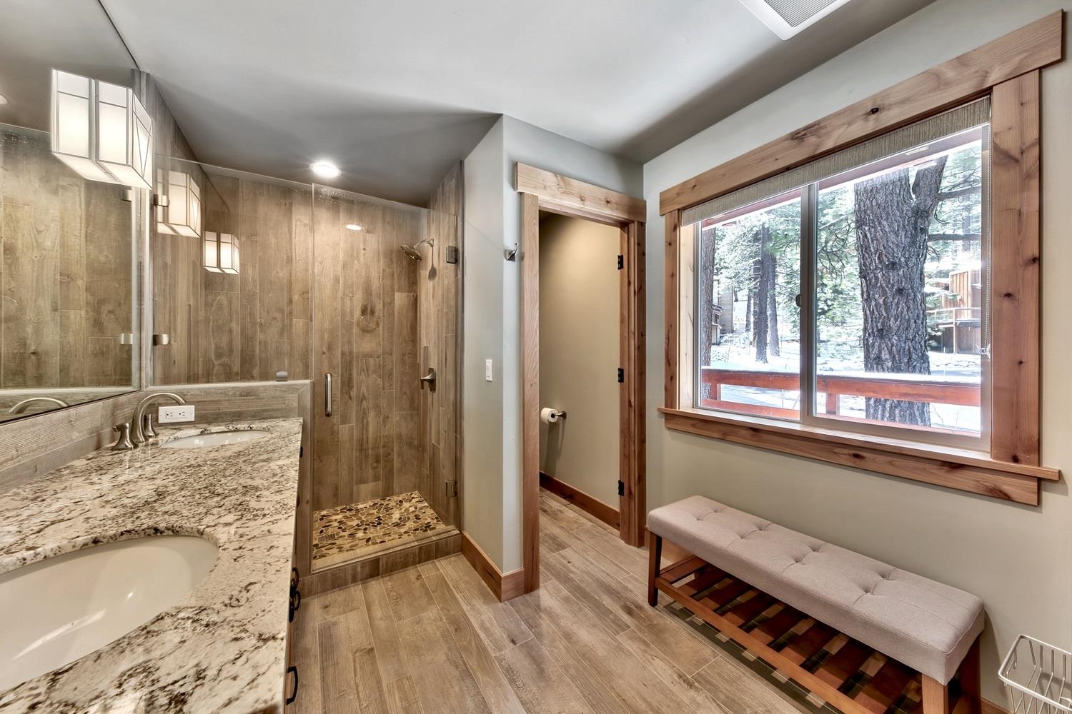164 Basque Drive Truckee, CA 96161 - Photo 16 of 21 a bathroom with a granite countertop sink toilet and shower