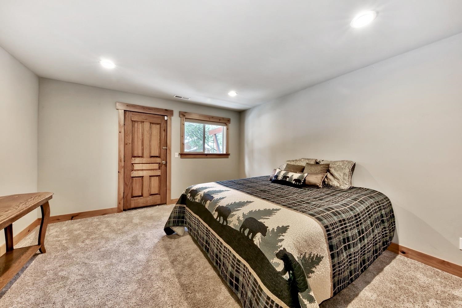 164 Basque Drive Truckee, CA 96161 - Photo 20 of 21 a bedroom with a bed a window and closet