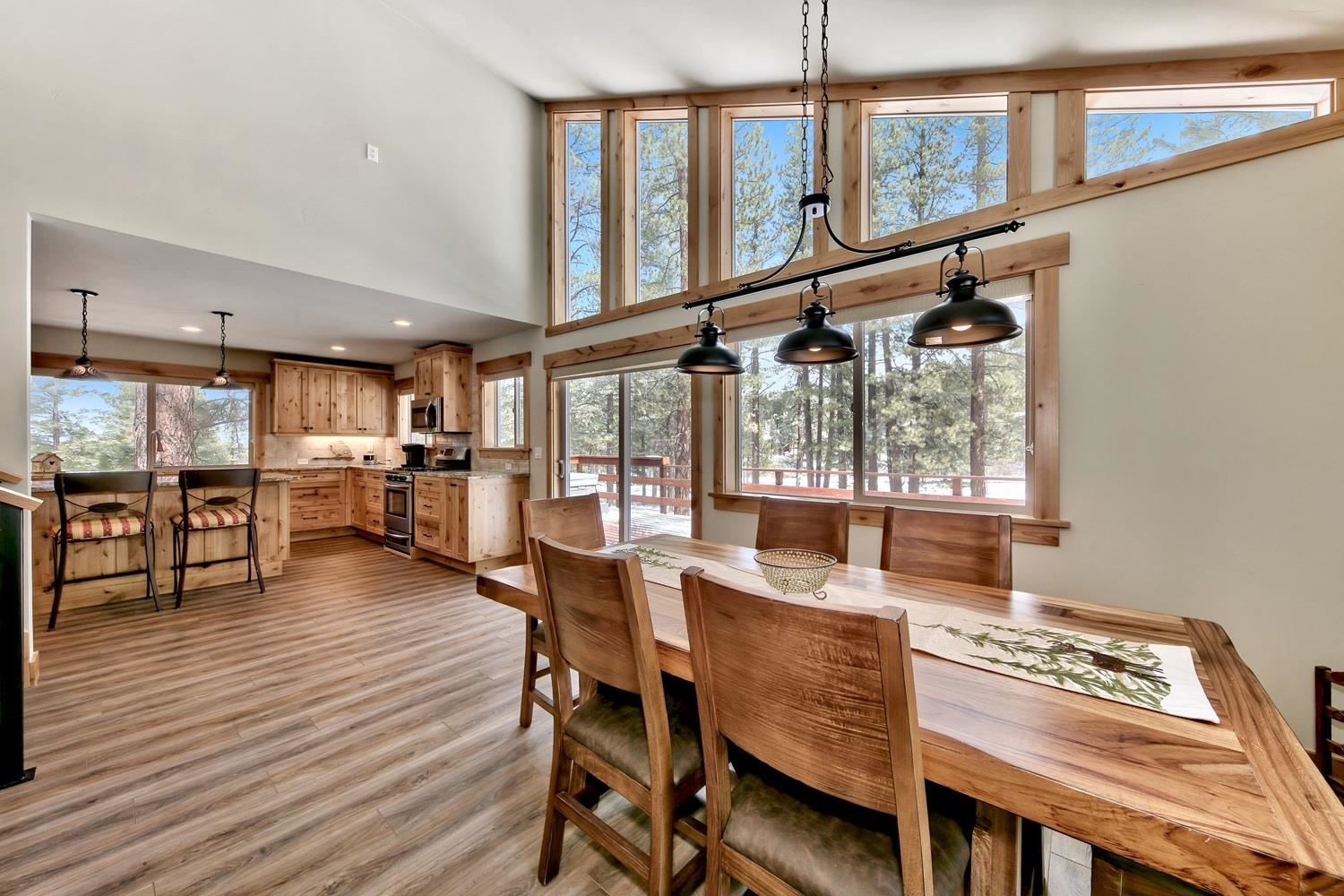 164 Basque Drive Truckee, CA 96161 - Photo 5 of 21 a dining room with furniture and wooden floor