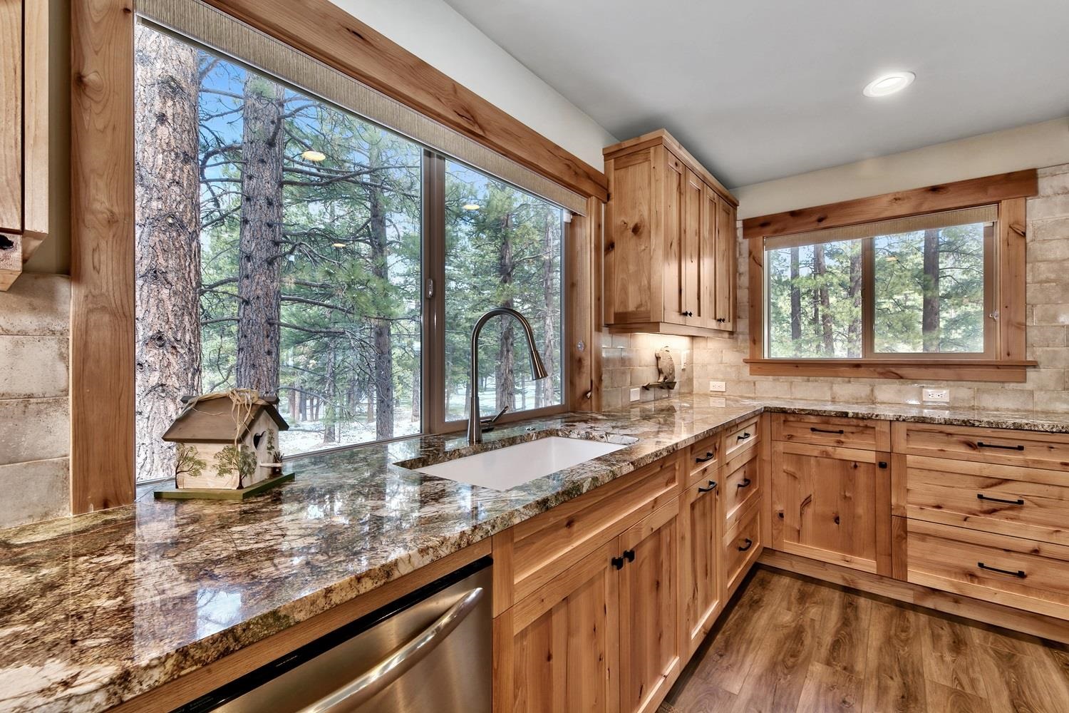 164 Basque Drive Truckee, CA 96161 - Photo 9 of 21 a kitchen with a large window a sink and counter space