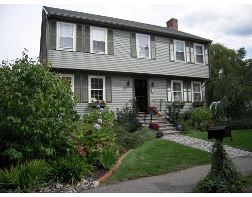 19 Schooner Ridge Marblehead, MA 01945 - Photo 1 of 19 a front view of a house with garden
