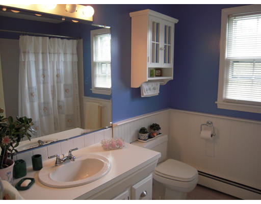 19 Schooner Ridge Marblehead, MA 01945 - Photo 15 of 19 a bathroom with a sink toilet and a mirror