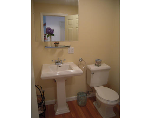 19 Schooner Ridge Marblehead, MA 01945 - Photo 7 of 19 a bathroom with a sink toilet and mirror