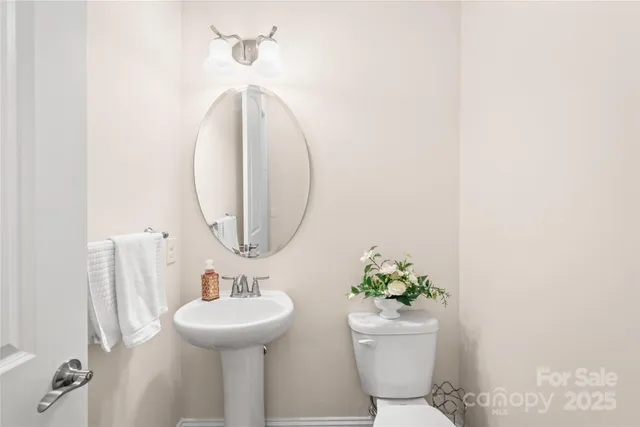 a view of entryway with wooden floor and stairs