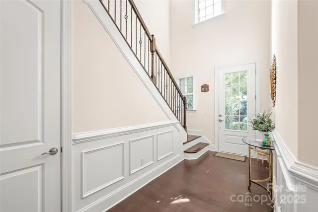 a view of a hallway with windows