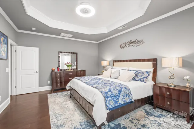a bathroom with double vanity sinks and a mirror