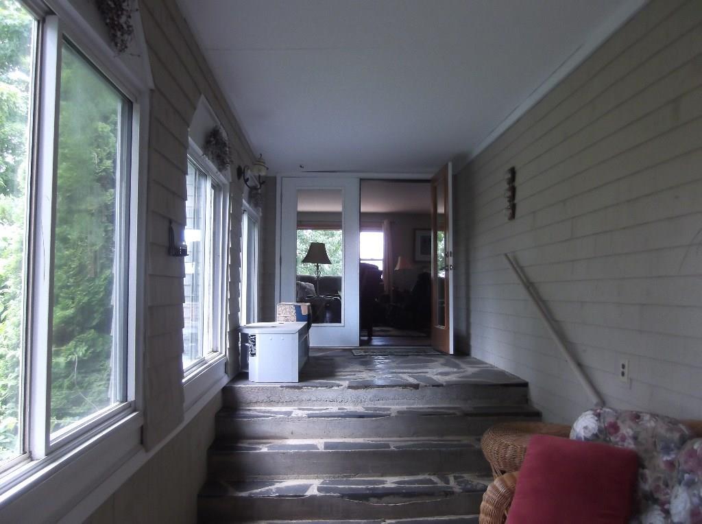 140 Ames Road Dover-Foxcroft, ME 04426 - Photo 4 of 30 Sun room with atrium door to family...