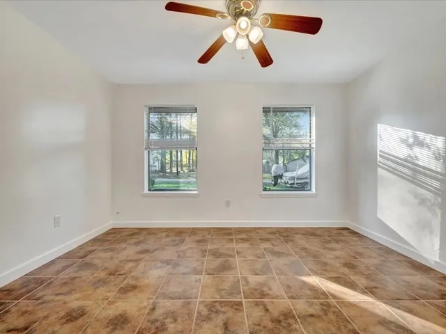 a view of an empty room and window
