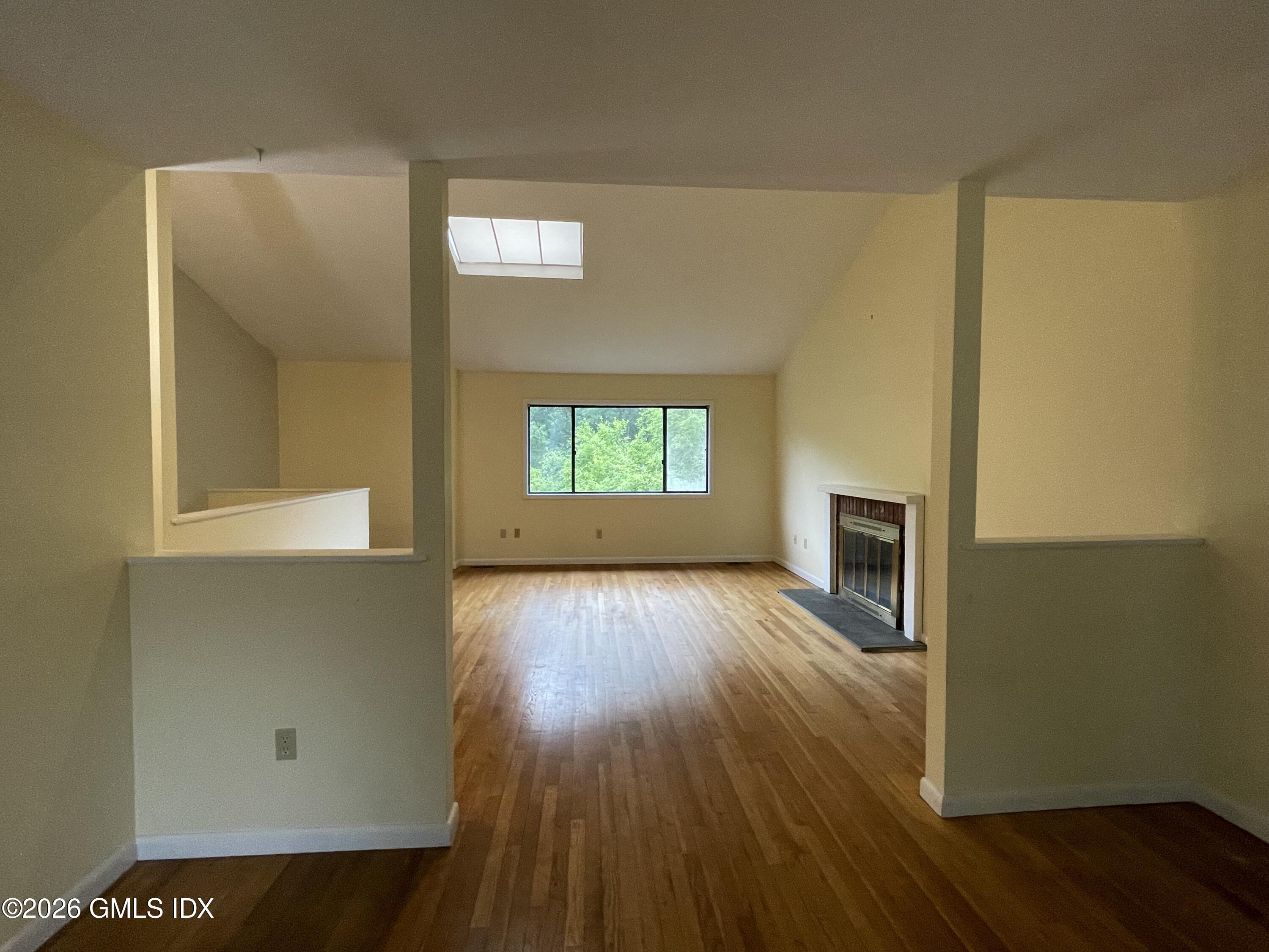 21 Windsor Lane Cos Cob, CT 06807 - Photo 6 of 24 dining room to living room