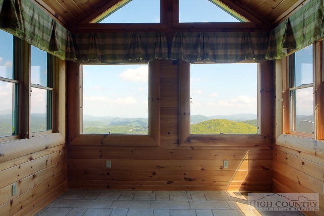 238 Knob Hill Road Boone, NC 28607 - Photo 4 of 25 a bathroom with a tub and window