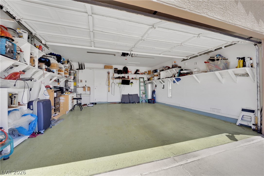 530 Grape Drive Henderson, NV 89015 - Photo 39 of 39 A well-organized garage provides ample storage solutions with integrated shelving.