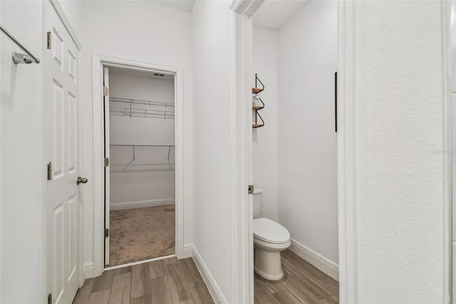a bathroom with a granite countertop shower