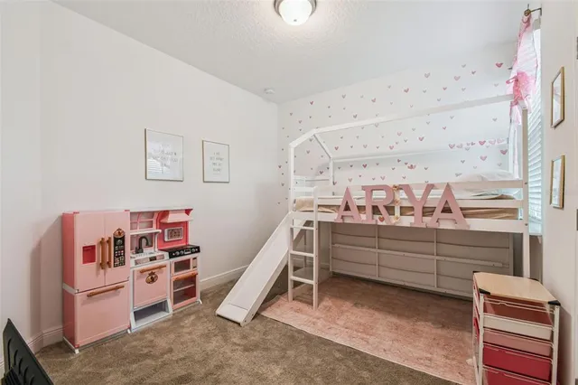 a room with furniture and white walls