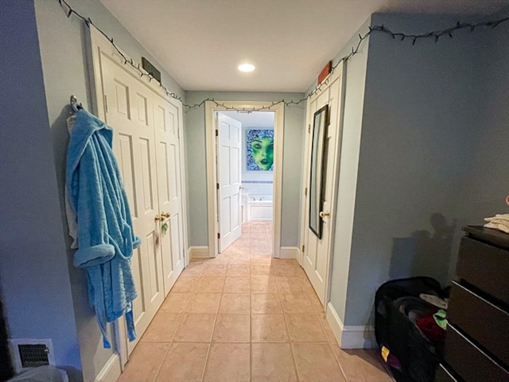 57 Dwight Street, Unit G Boston, MA 02118 - Photo 21 of 28 a view of a hallway with windows