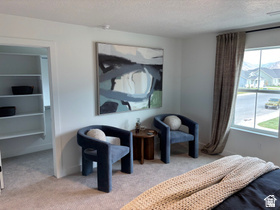 12 South Moonlit Road Mapleton, UT 84664 - Photo 6 of 14 Bedroom with light carpet and a textured ceiling