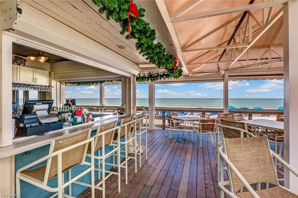 6804 Sand Pointe Circle Naples, FL 34108 - Photo 43 of 49 At your service...lunch, beverages, or yoga on the beach...Pelican Bay has it all!