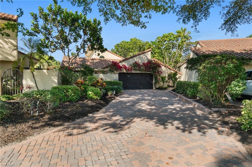 6804 Sand Pointe Circle Naples, FL 34108 - Photo 46 of 49 Coastal Villa awaits. Freshly painted exterior and new landscaping welcome you home.